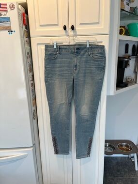 White House Black Skinny Jeans with zipper at each ankle 
Size 14